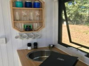 White Jacaranda Tiny House by Tiny Away